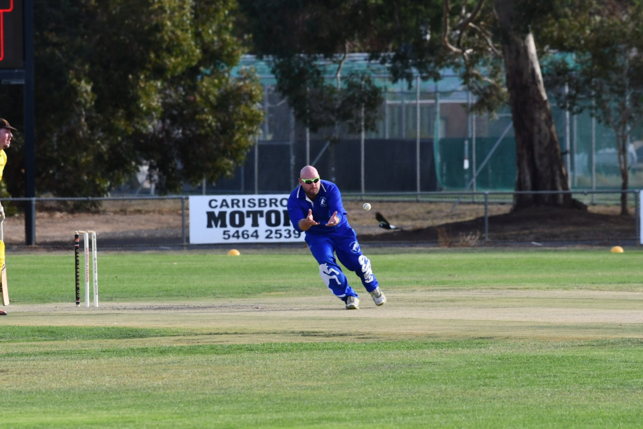 Grant Rogers finishes the match with a caught and bowled.