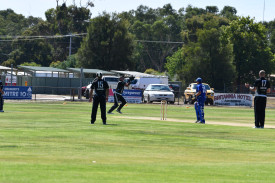 Fred Penhall holds on to this catch to remove Dean Walker.