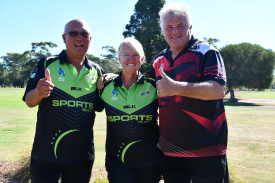 Des Yin Foo, Michelle Harris and Jeff Smith celebrate their Lawn Bowls Challenge victory.