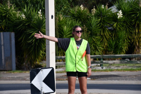 Abbey Klemm turned her hand to marshalling by directing the cycling leg.