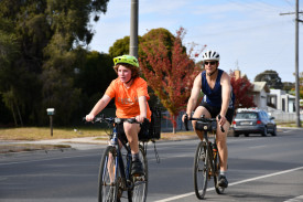 Henry and Duncan Bates completed the reverse triathlon side-by-side.