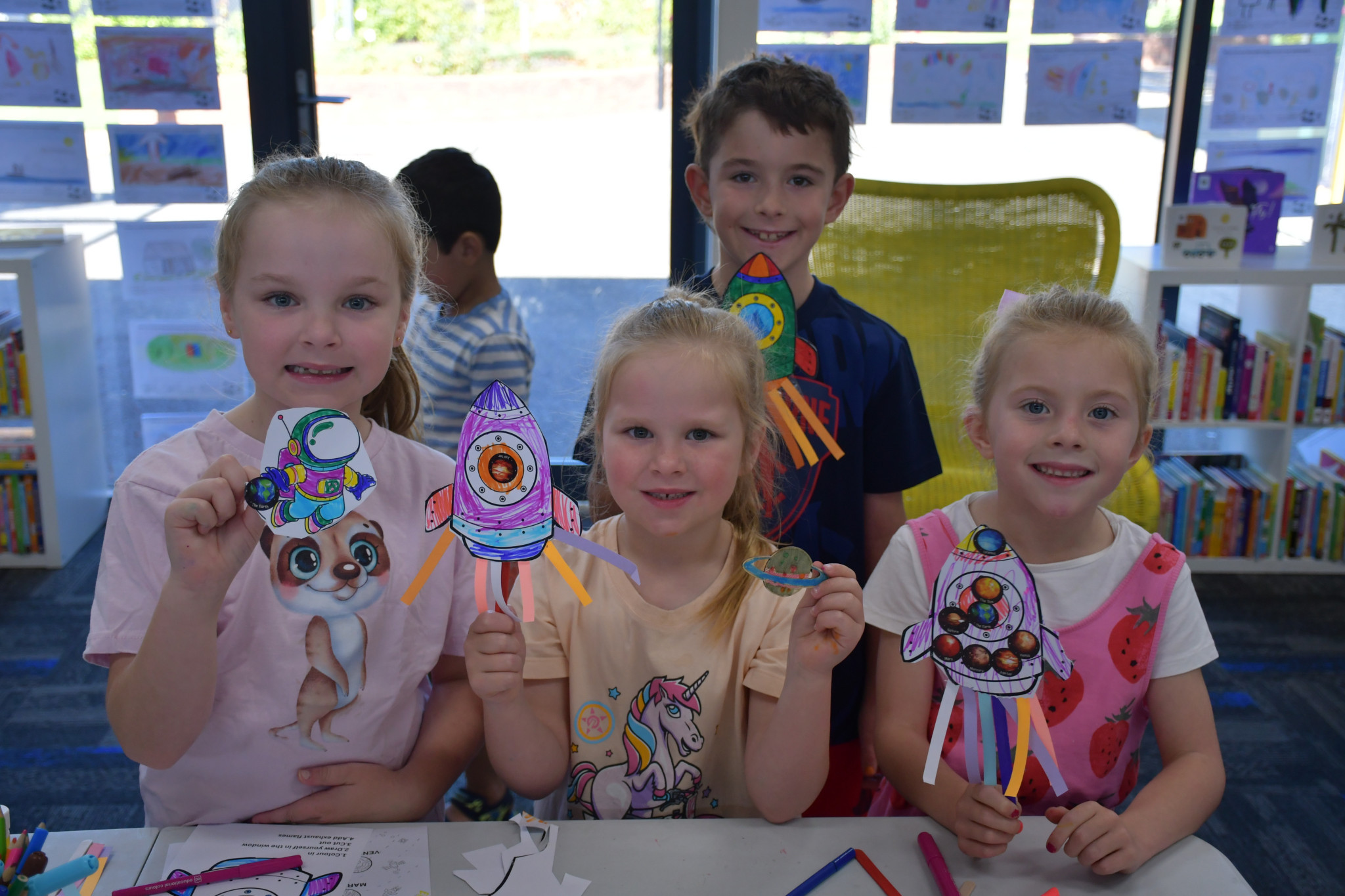Elsie and Evie Gardiner alongside Bastian and Penny Fox are all ready for blast off with their colourful spaceships.