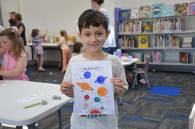 Reid Dunstone had fun working on his solar system picture.