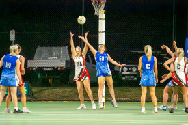 Newstead and Trentham battle for possession.