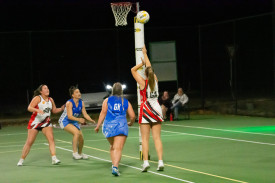 Sharna Ford goes for goal for Trentham.