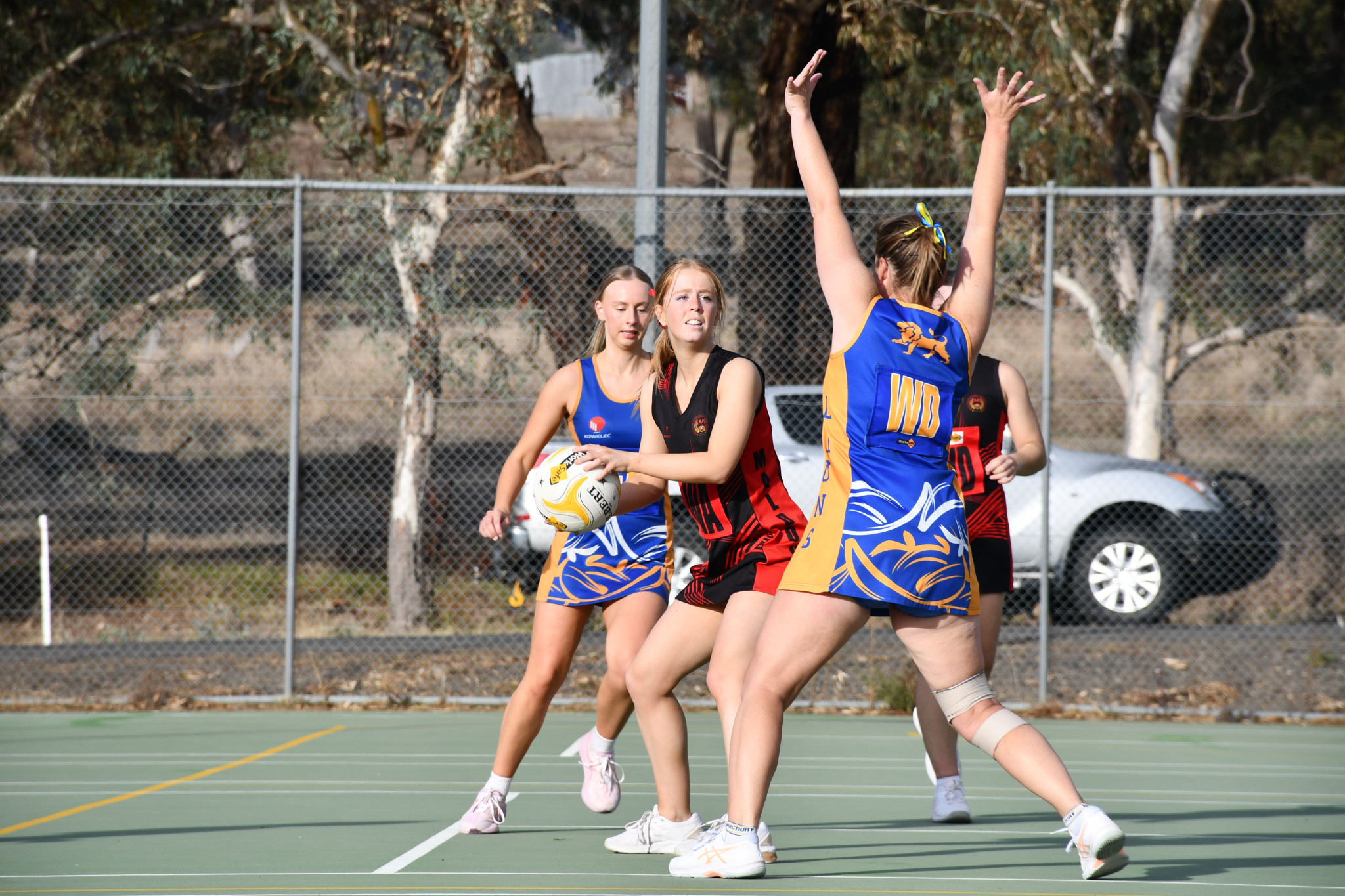 Sophie Bennett looks to navigate the Harcourt defence.