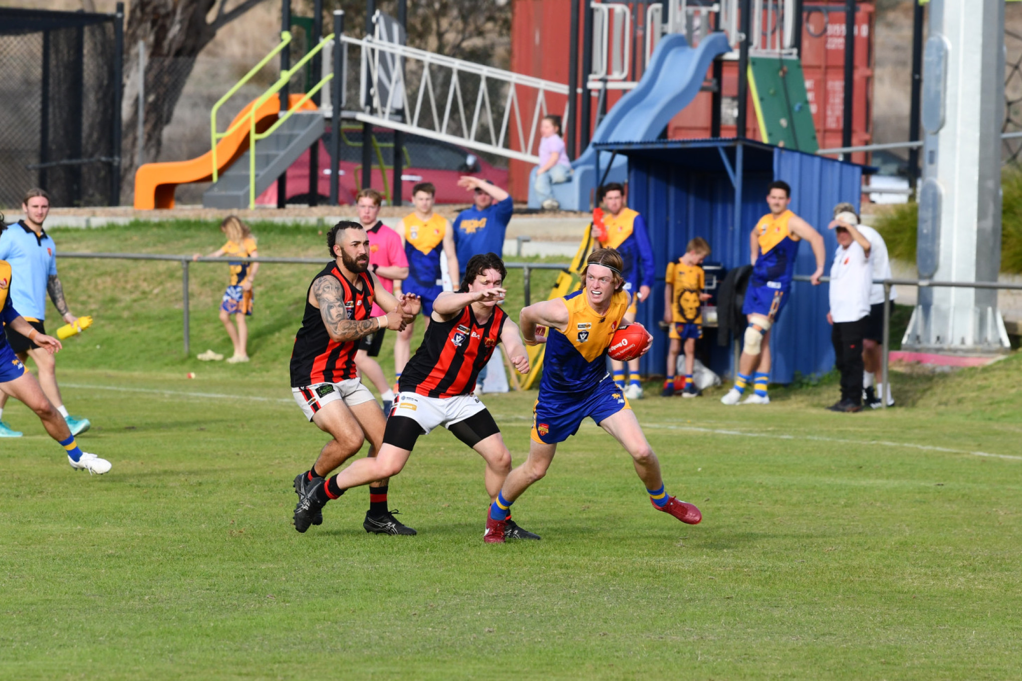 Luke Anderson runs away from the Maldon tackle.