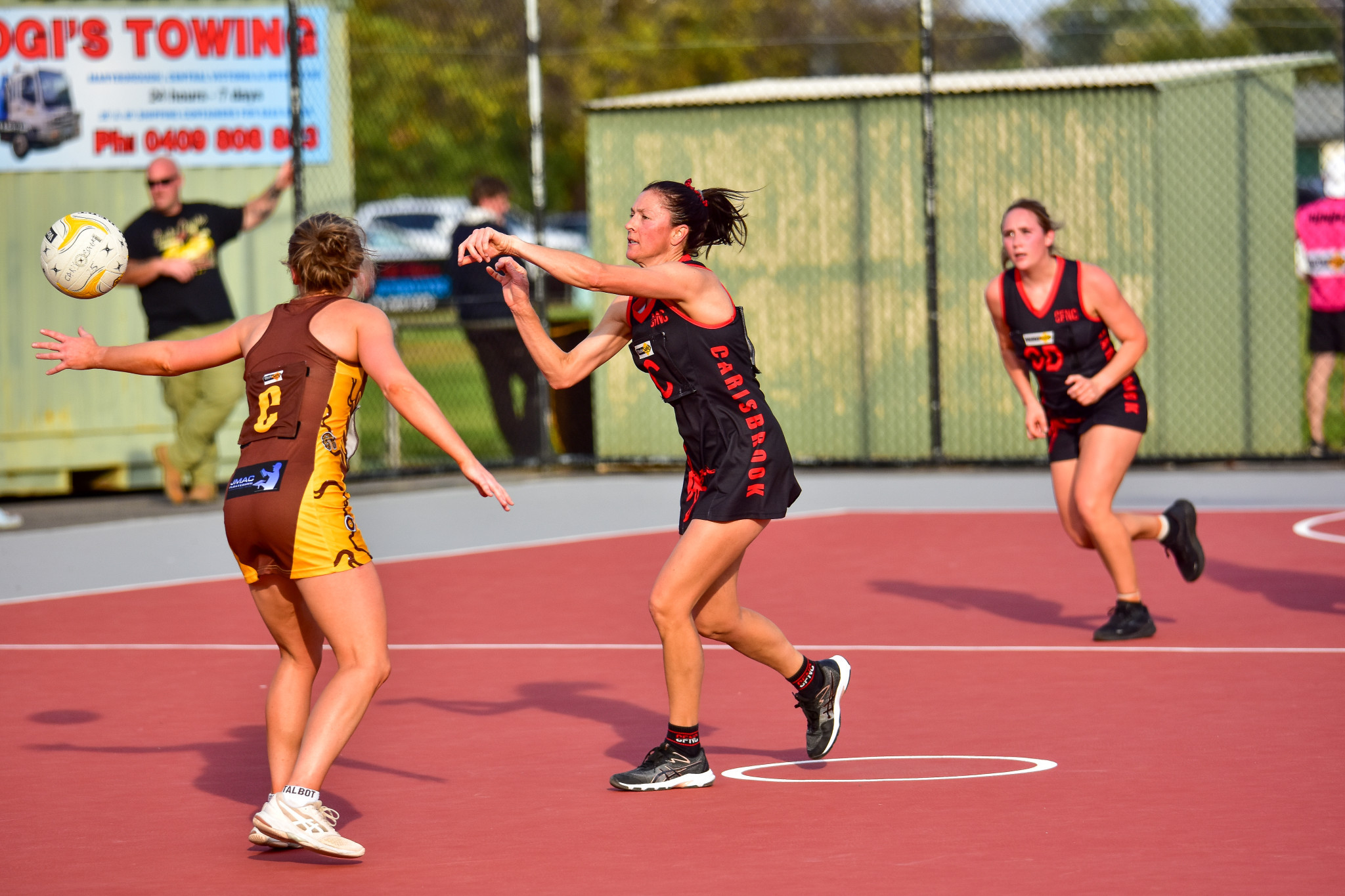 Laura Hurse sends the ball out of the centre for Carisbrook.