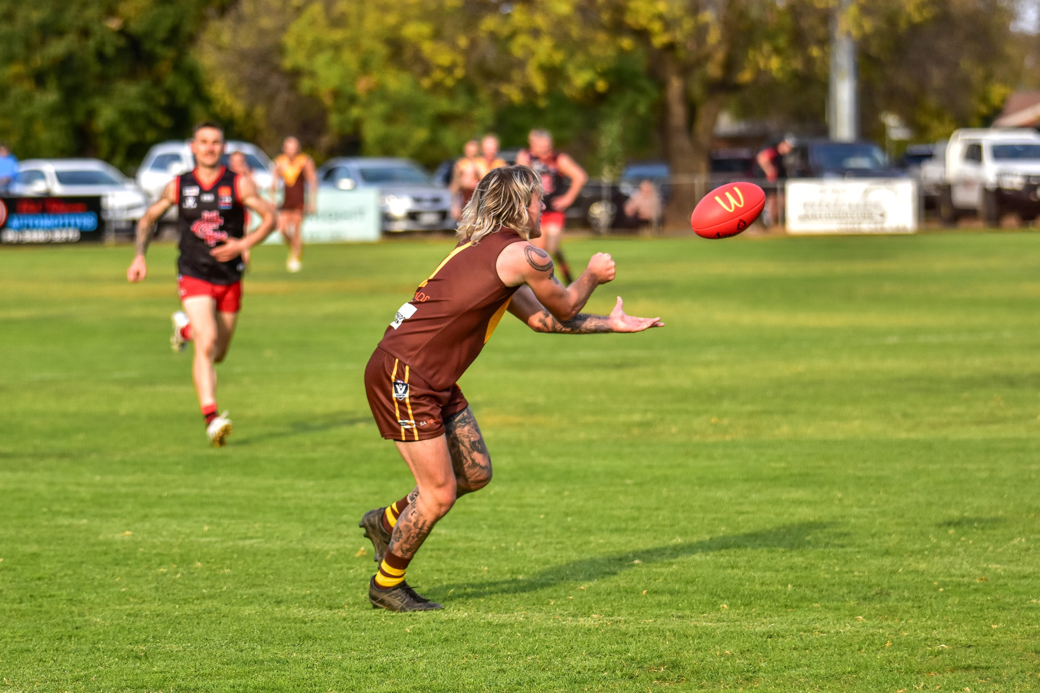 Jude McGuire gets the hand ball away for Talbot.