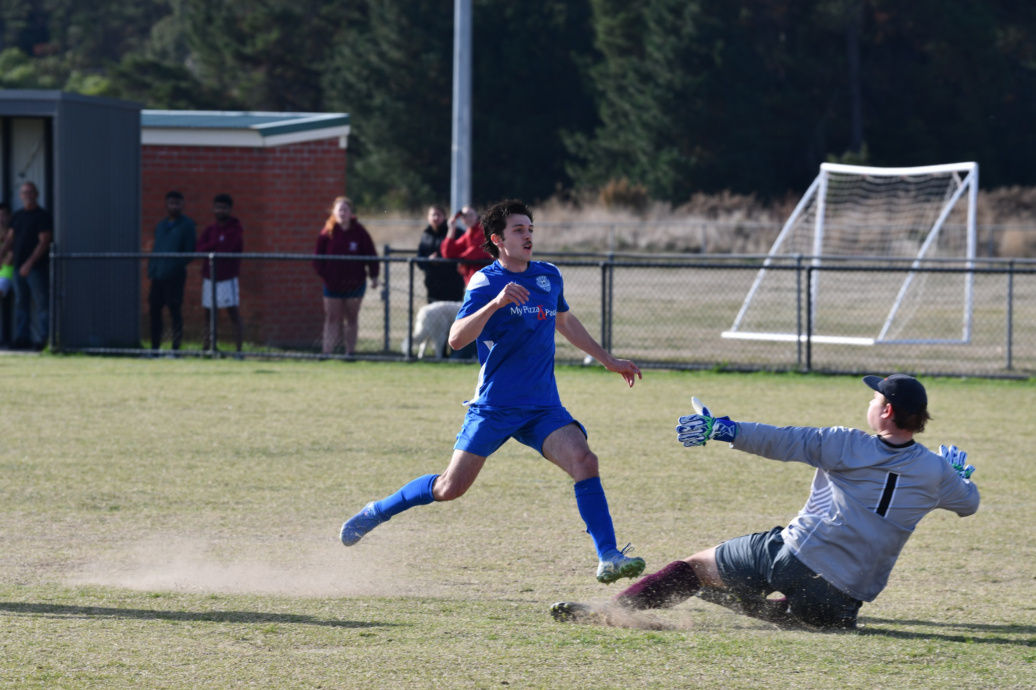 Julian Callea avoids the charging Thomas Appleton to net Maryborough Soccer Club’s first goal in their 2-1 victory over the Creswick Cougars.
