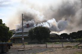 Smoke was seen billowing from the property for hours as firefighters worked to extinguish the blaze.