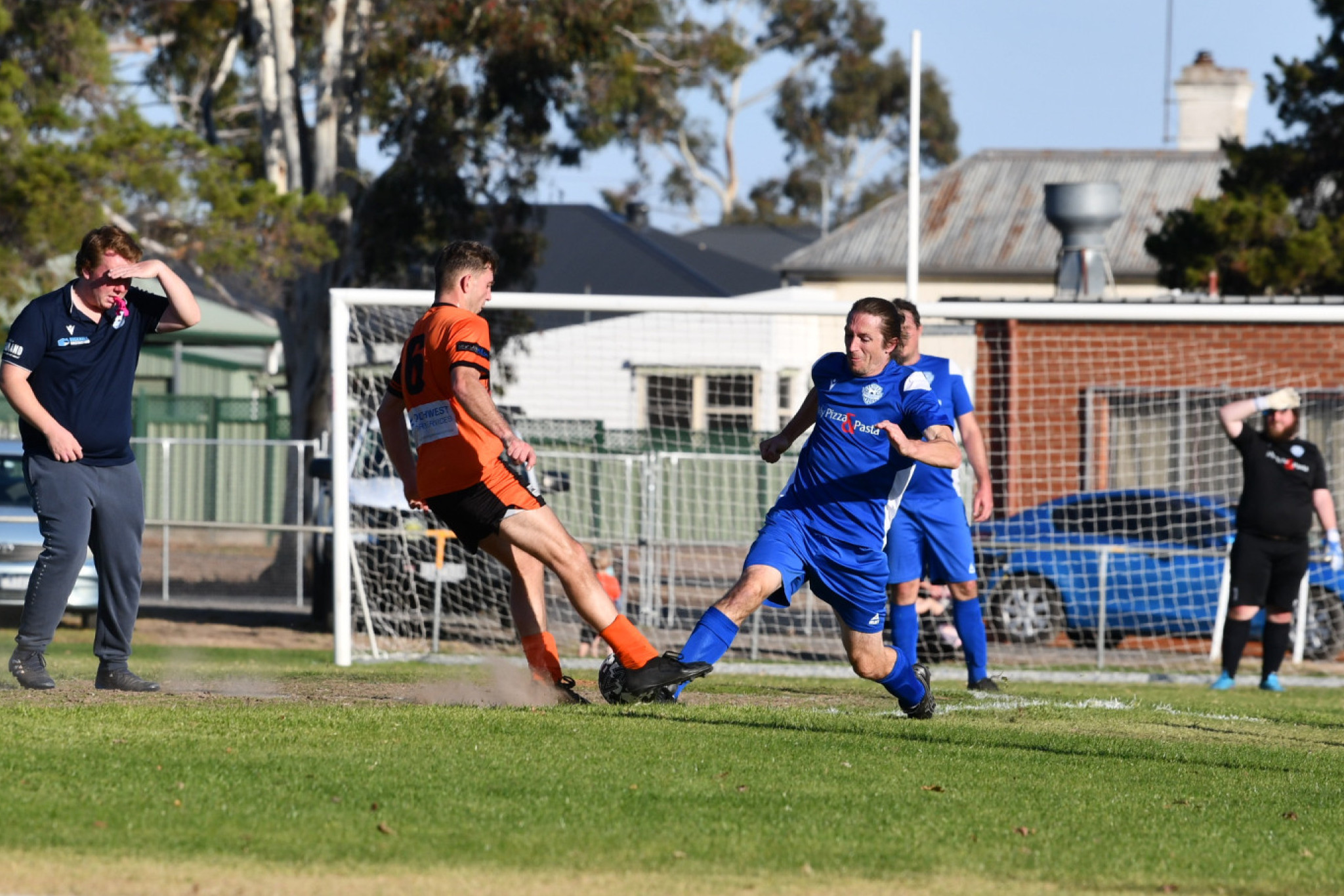 James Macer puts in a challenge in the midfield.