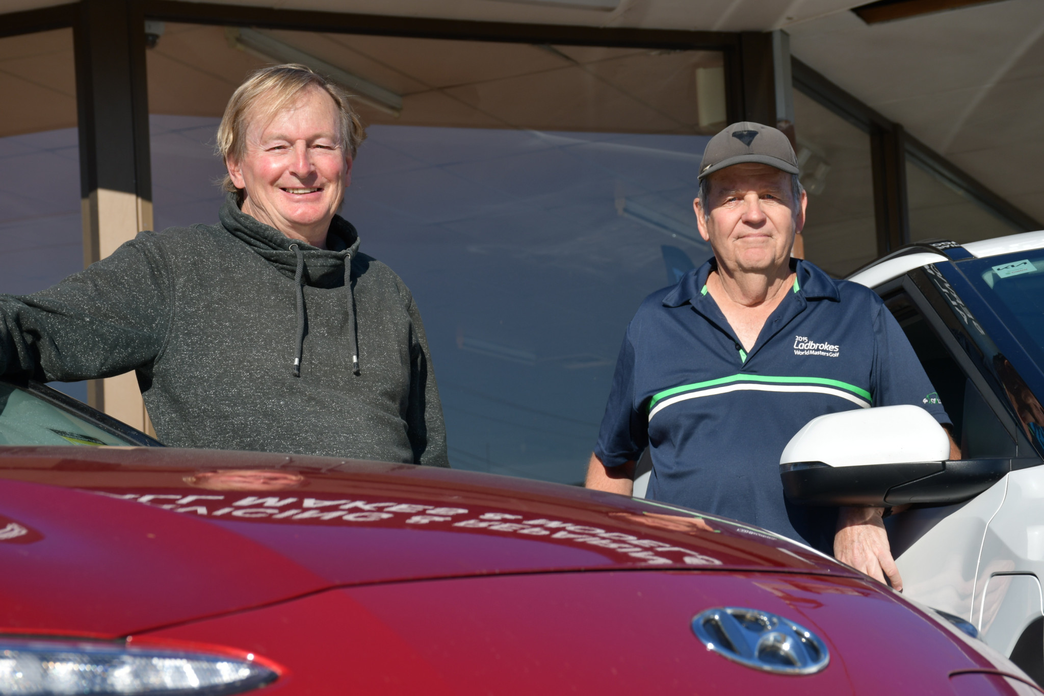 The future is electricity for event organiser Tony Macer and EV convert Greg James.