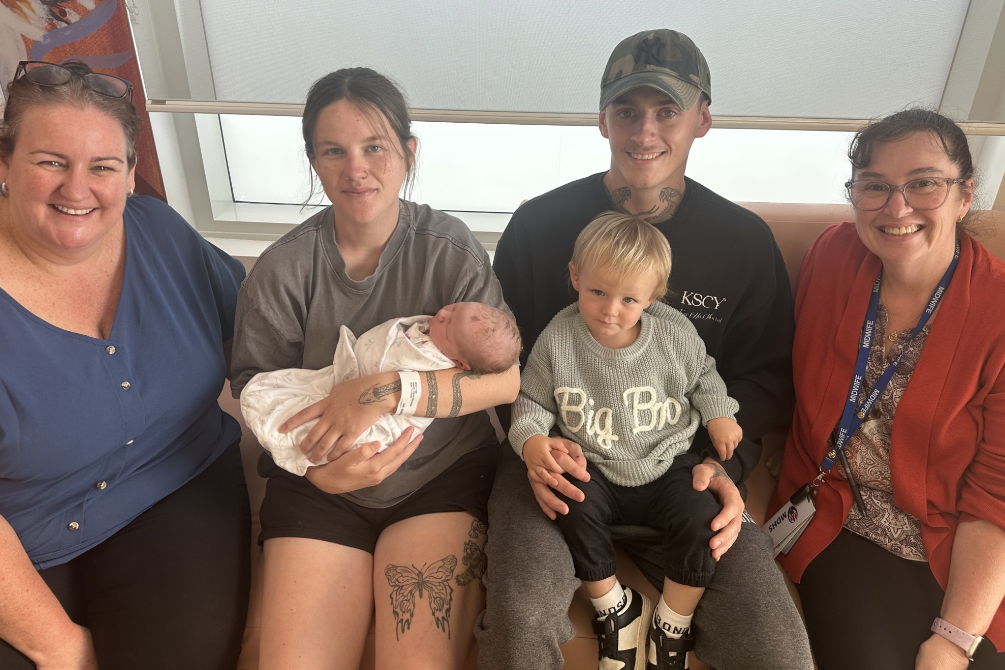 Baby Lylah with proud parents Isabelle Lugg and Jack Broad, big brother Arden, and MDHS MGP midwives Kylie Cole and Penny Browne.