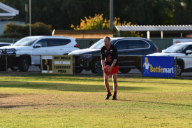 Andrew Toan scans the field for options out of defence.