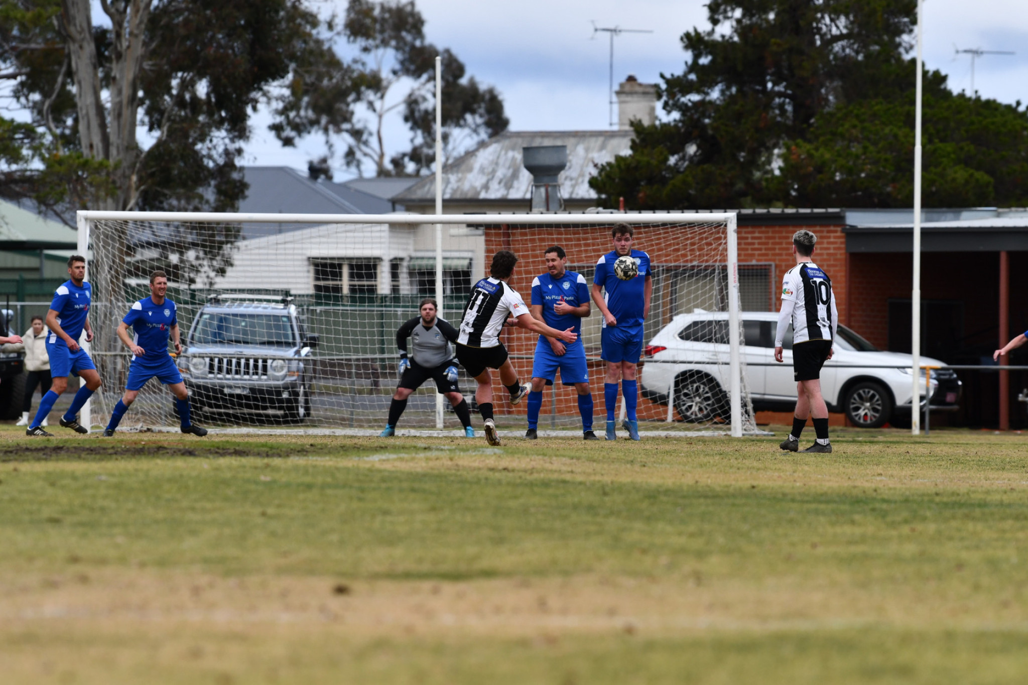 Maryborough Soccer Club put a lot on the line on Sunday in their defeat to Ballarat North United, including Bj Melton getting in the way of this Charlie Richardson free kick.