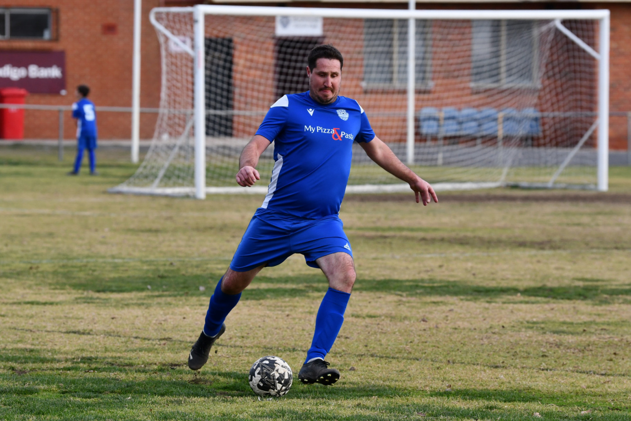 Jack Schaffer looks to maintain possession.