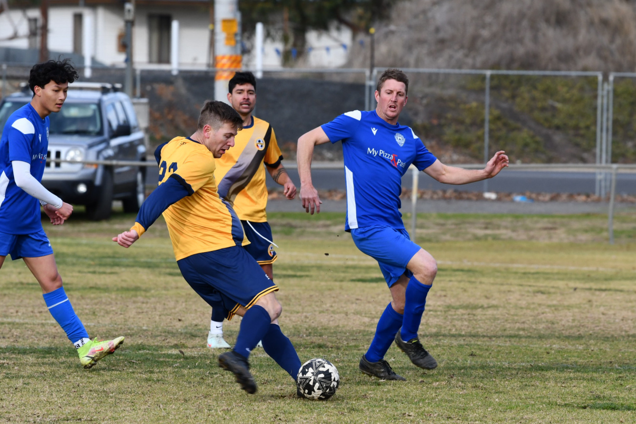 Luke Bucknall, pictured against Bacchus Marsh, looks to get his body in the way of an incoming shot on goal.