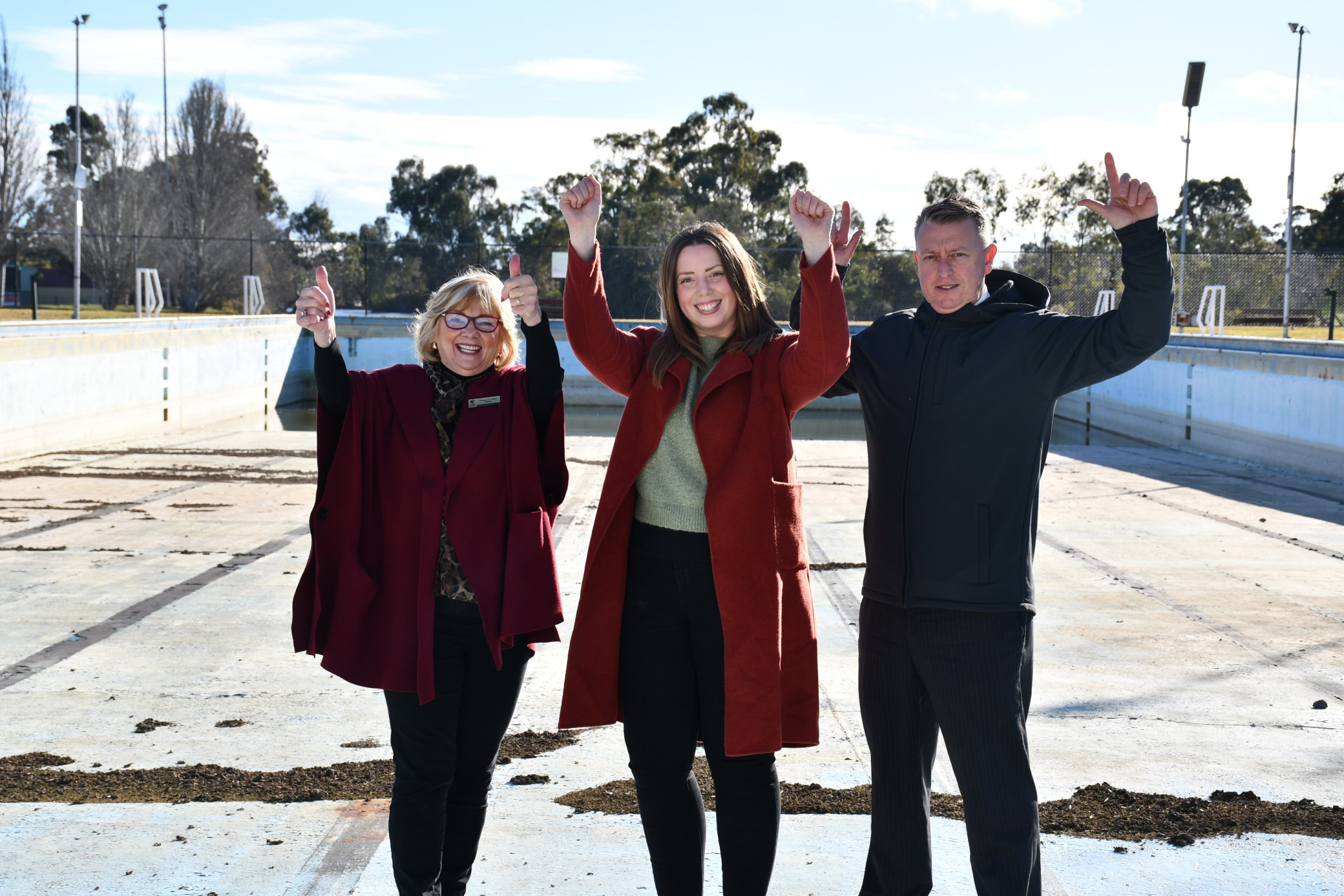 Central Goldfields Shire Council mayor Grace La Vella, Member for Ripon Martha Haylett and Friends of Maryborough Outdoor Pool Precinct Inc member Dan Davison were diving for joy at Tuesday’s announcement.