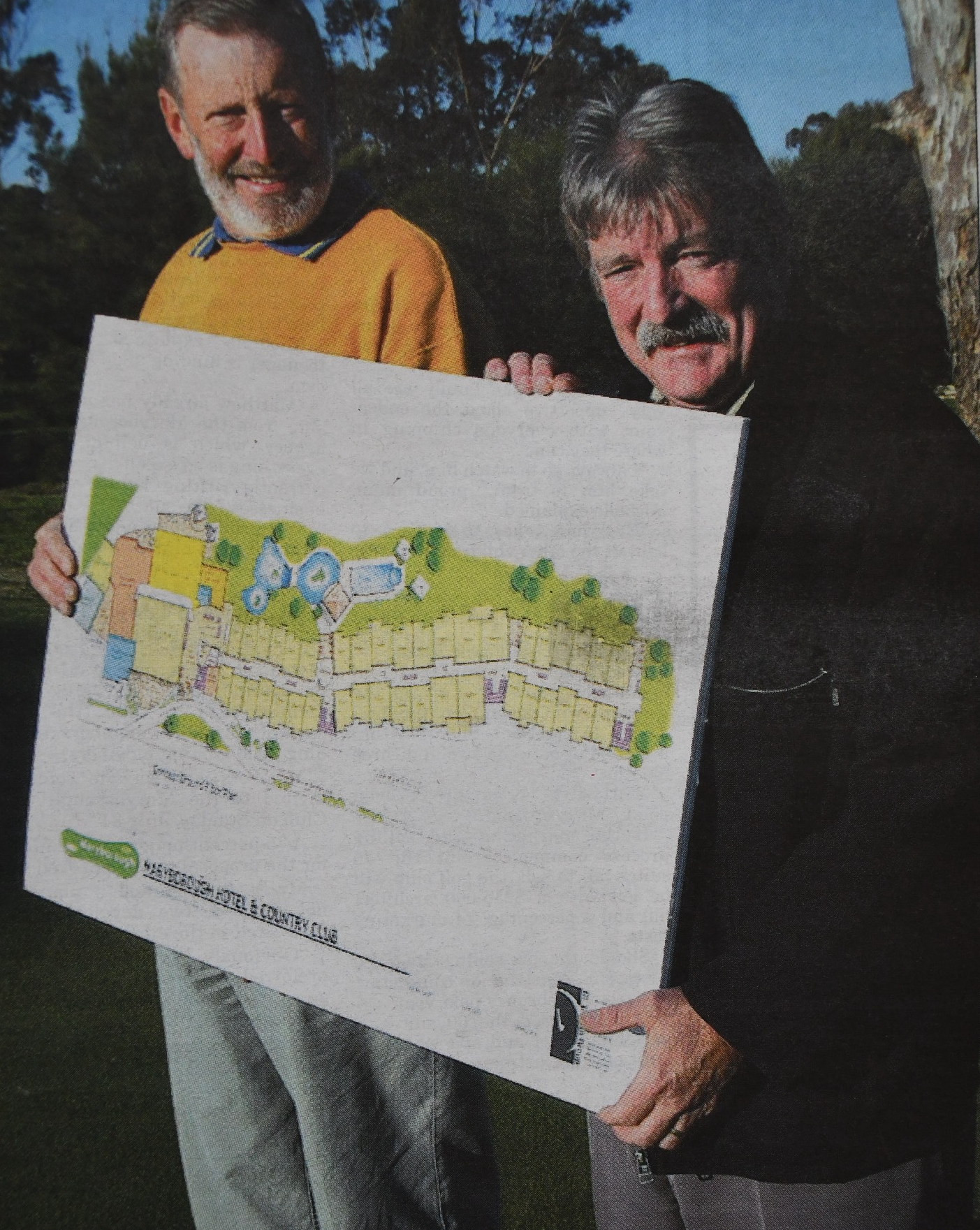 Maryborough Golf Club’s Geoff Newell and Rick Scott hold a sketch of the proposed $13 million development.