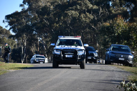 Victoria Police largely cordoned off Menzies Drive as investigations got underway. 080725 12