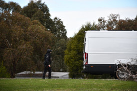 Various specialist departments attended the crime scene throughout Friday. 080725 13