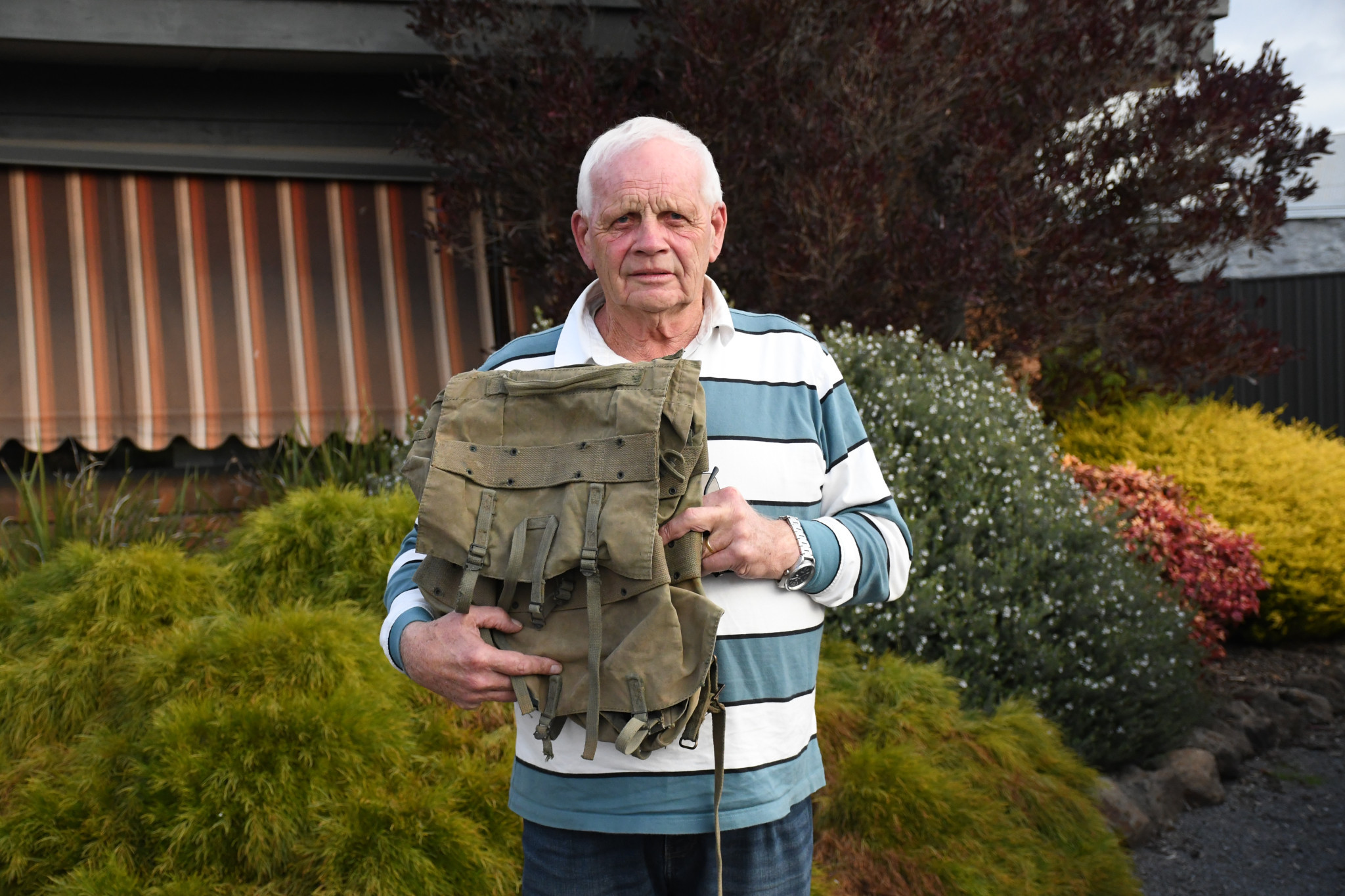 Lee Turton was reunitied with his own field pack from Vietnam, after Andre de Vanny cleverly tracked him down all the way from Sydney. Inset: Andre de Vanny and Lee at the Castlemaine Train Station. 110725 13