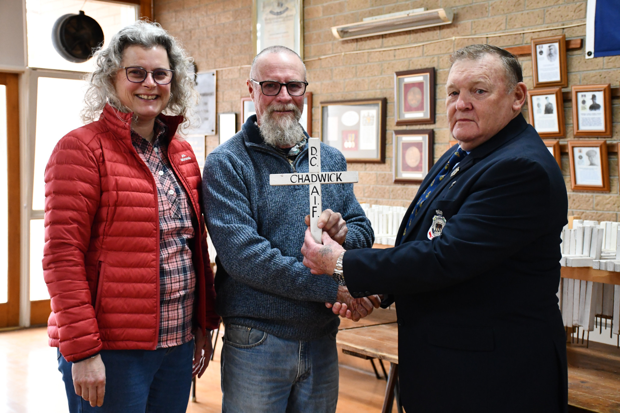 The first of many, Liesbeth and Andrew Long received the cross of a loved one from the Maryborough RSL's Roy 'Shady' Lane this week as they prepare to return them to the community.