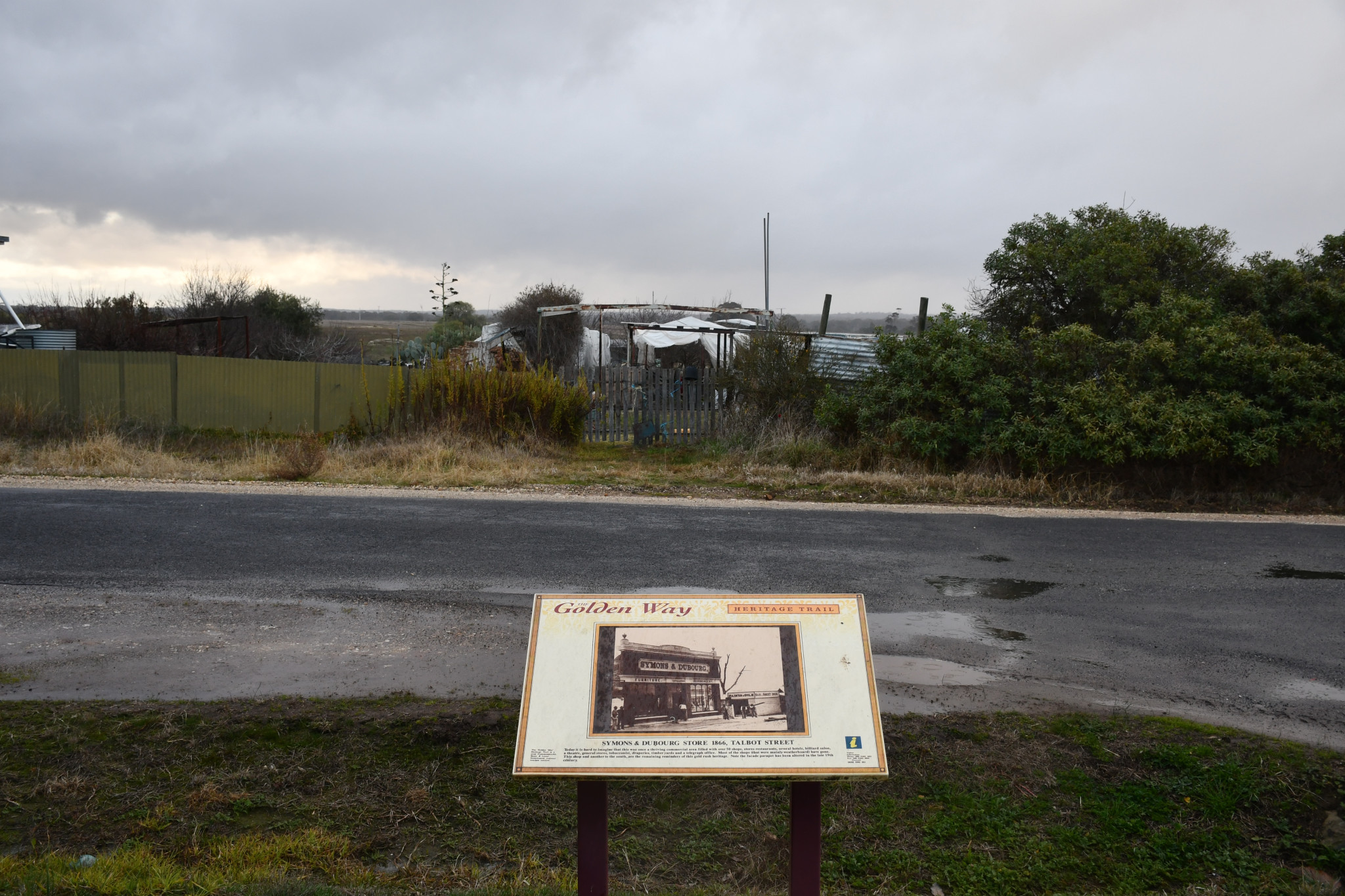 Only an old photograph, a short history, and a pile of rubble remain of the town’s historic storefront.