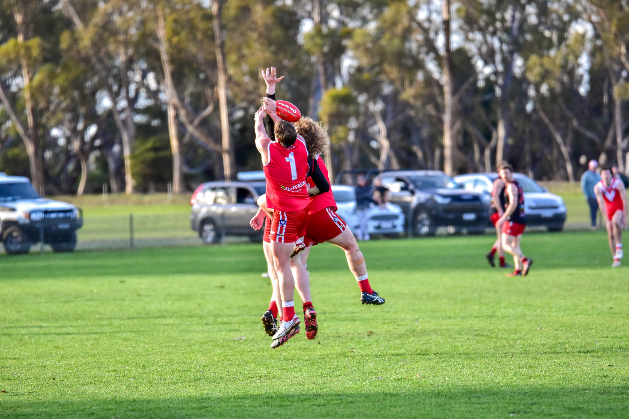 Natte’s Trent Mortlock and Carisbrook’s Nash Fraser fly high for a mark.