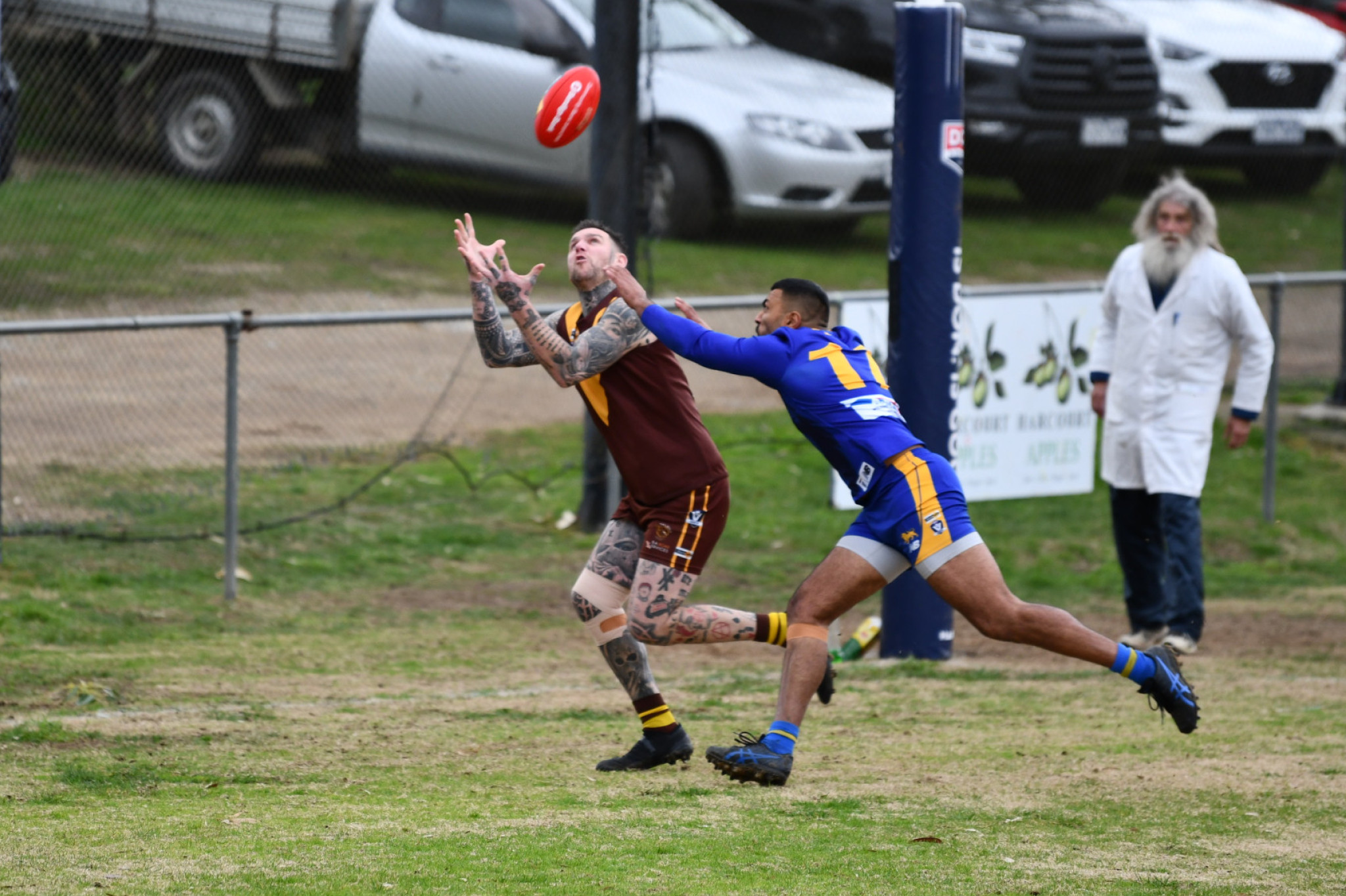 Talbot star Dean Limbach takes a strong mark against Harcourt’s Alex Code.