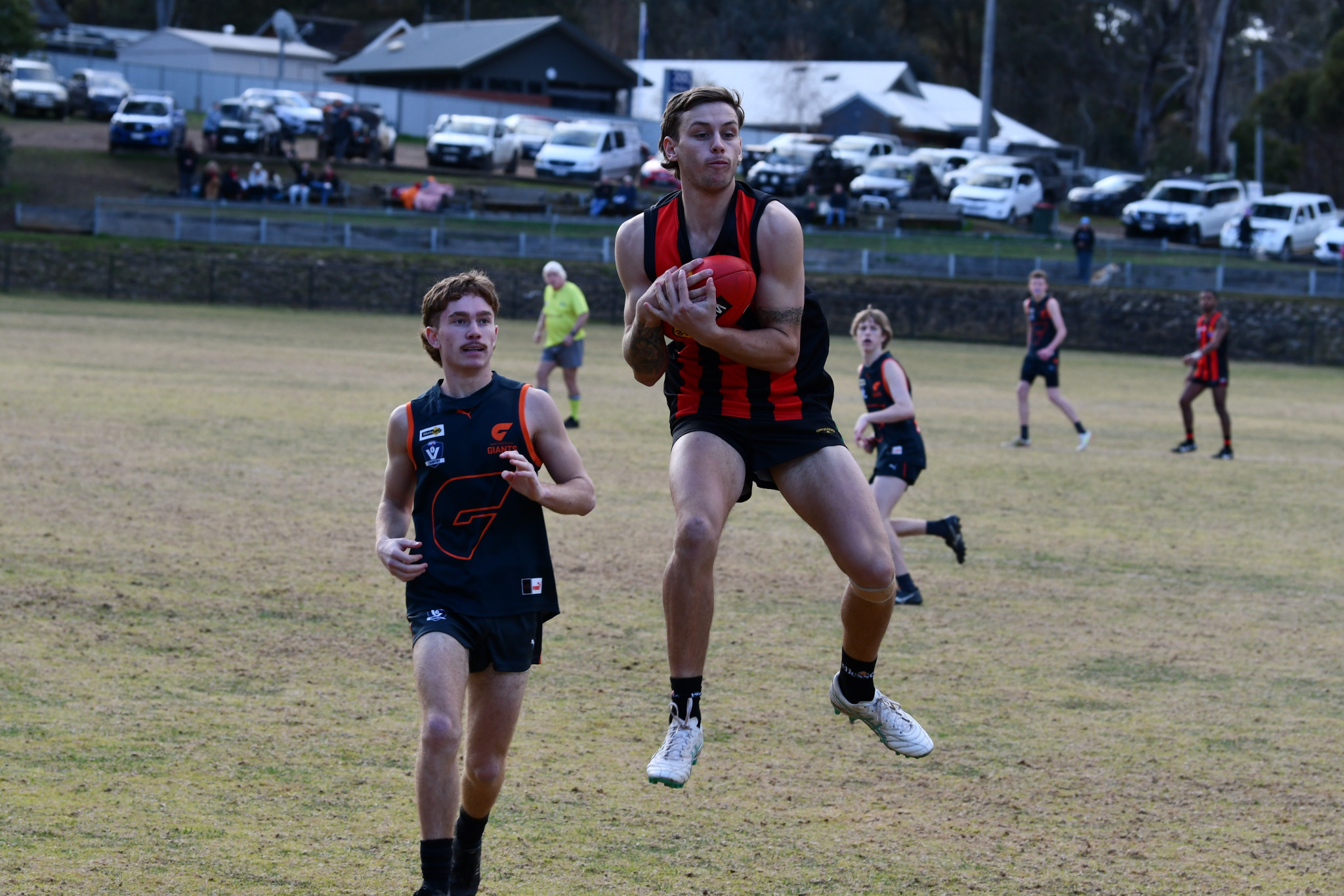 Sebastian Barnes takes a strong chest mark on the wing.