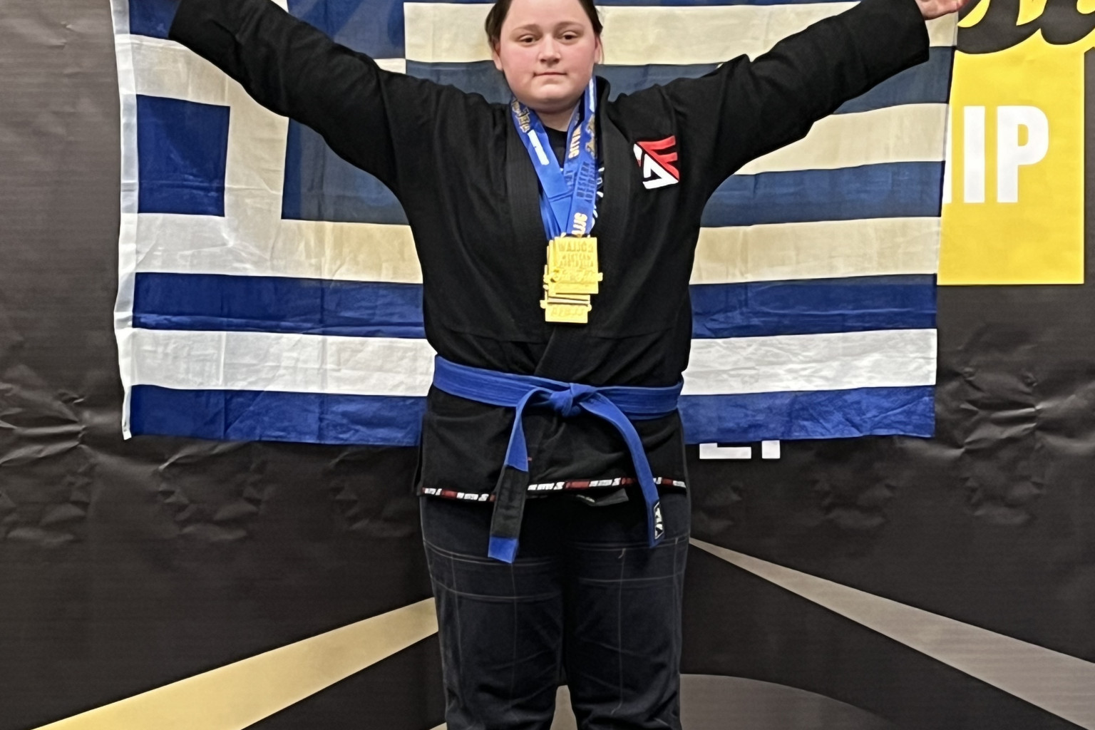 Alayla Savvidis celebrates with her four gold medals. Photo: Supplied.