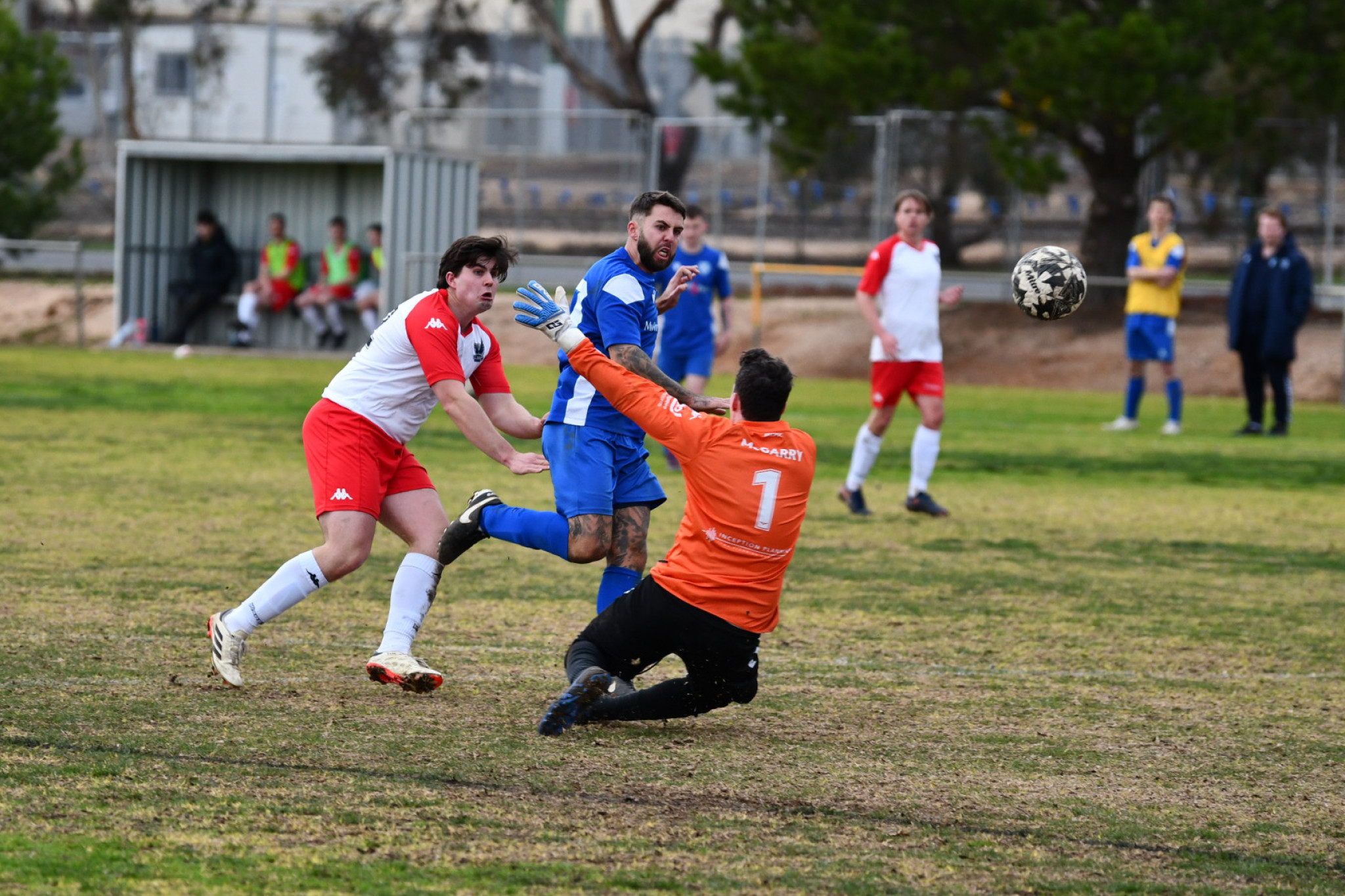 Brett Davey guides the ball past Conor McGarry, with his 78th minute goal giving Maryborough a chance.