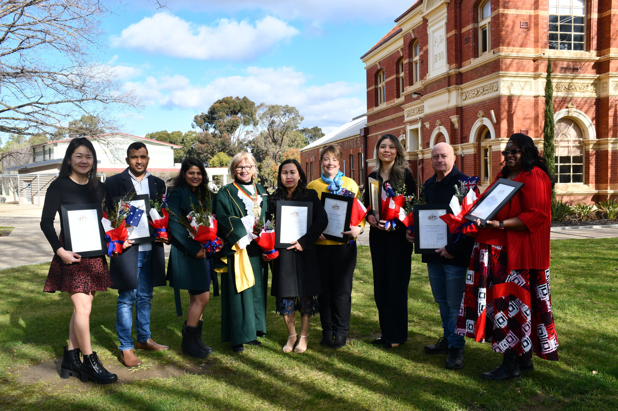 Eight new citizens marked the final step in their citizenship journey on Wednesday afternoon, all with unique journeys and backgrounds.