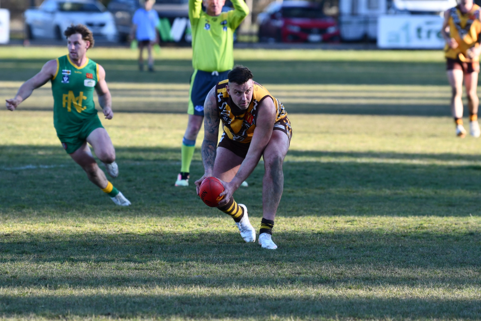 Michael Sikora gets a handball away for Talbot.