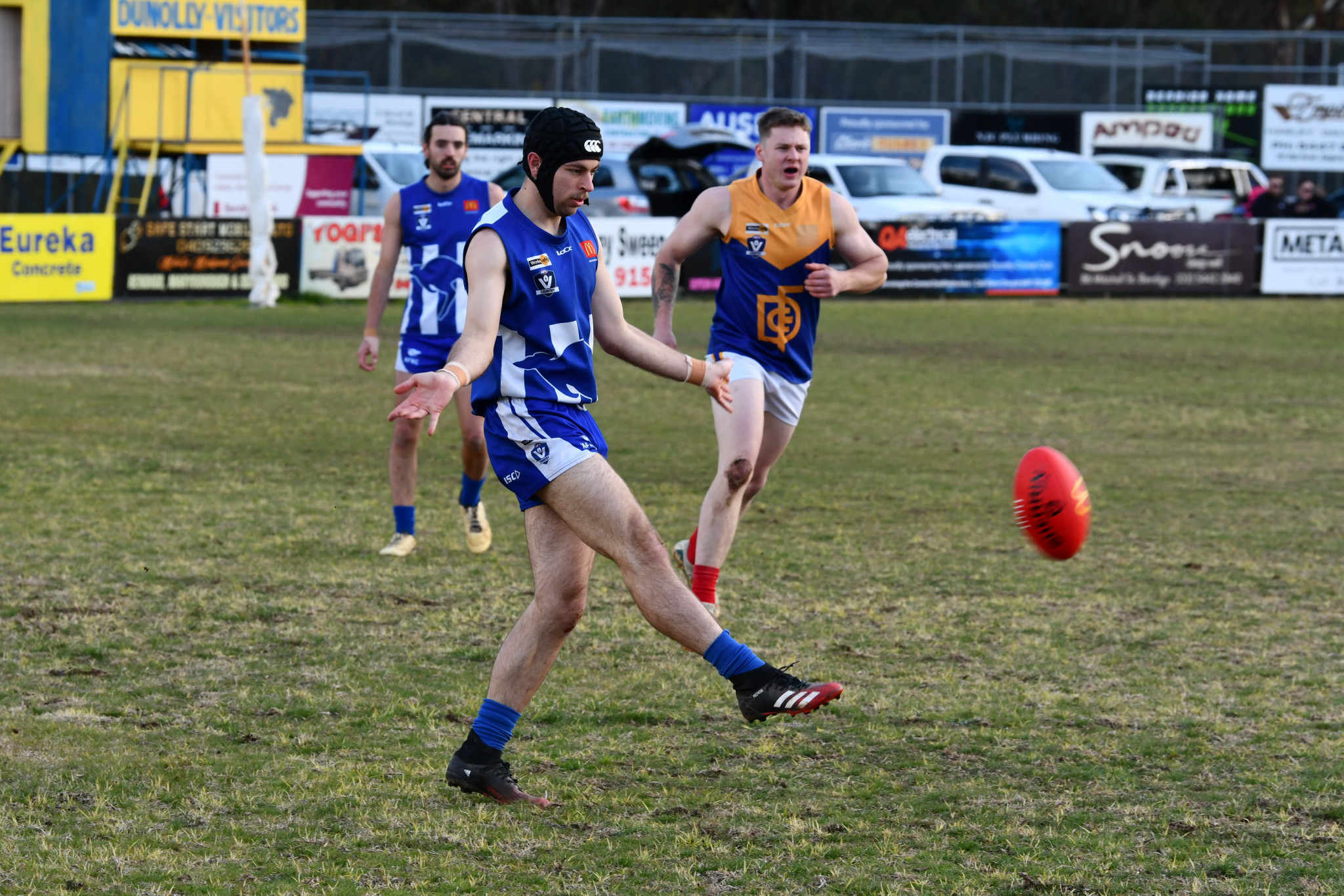 Ethan Hein kicks the ball out of defence for Newstead.