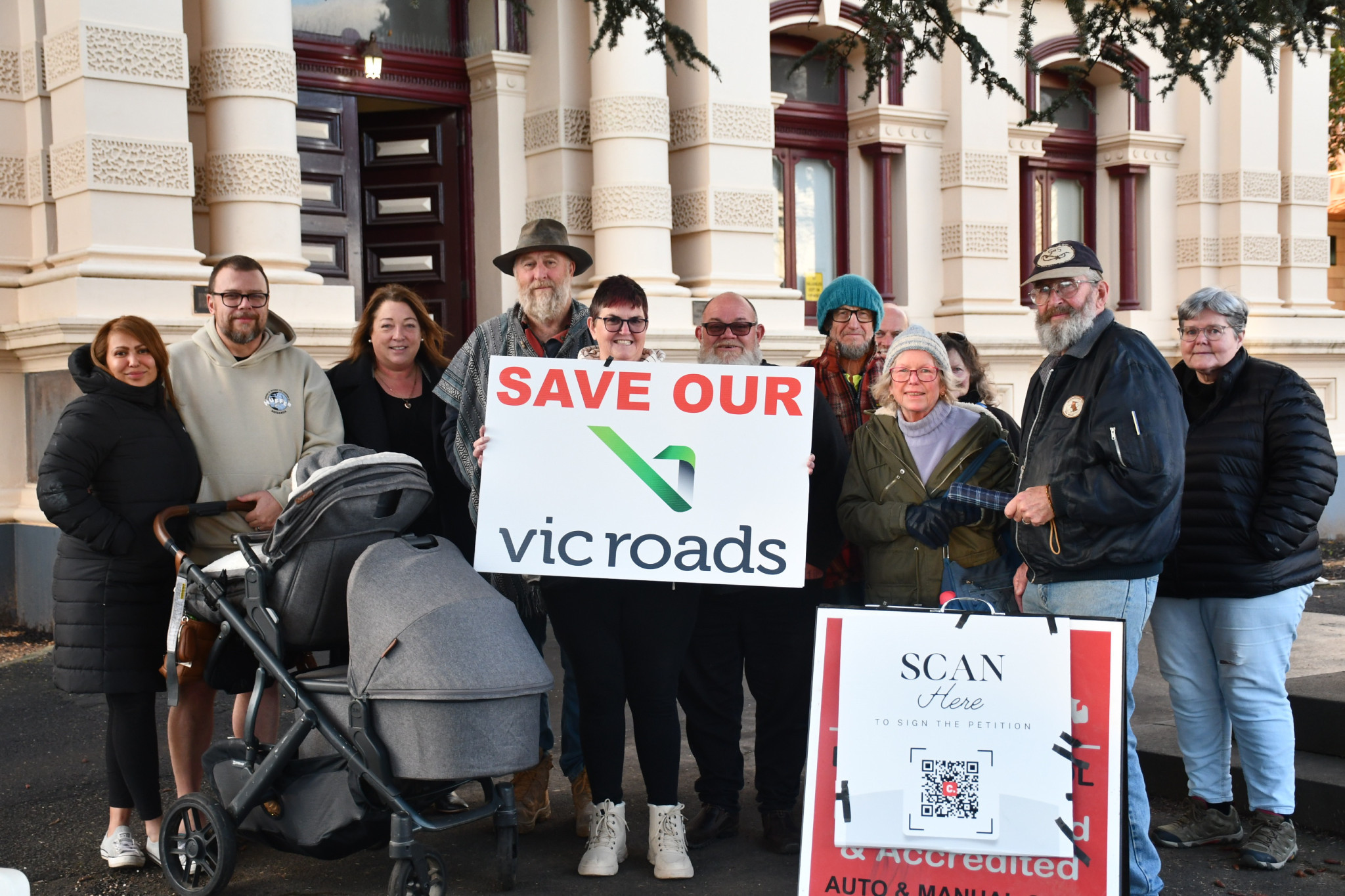 Community members gathered to show their support and continue collecting signatures.