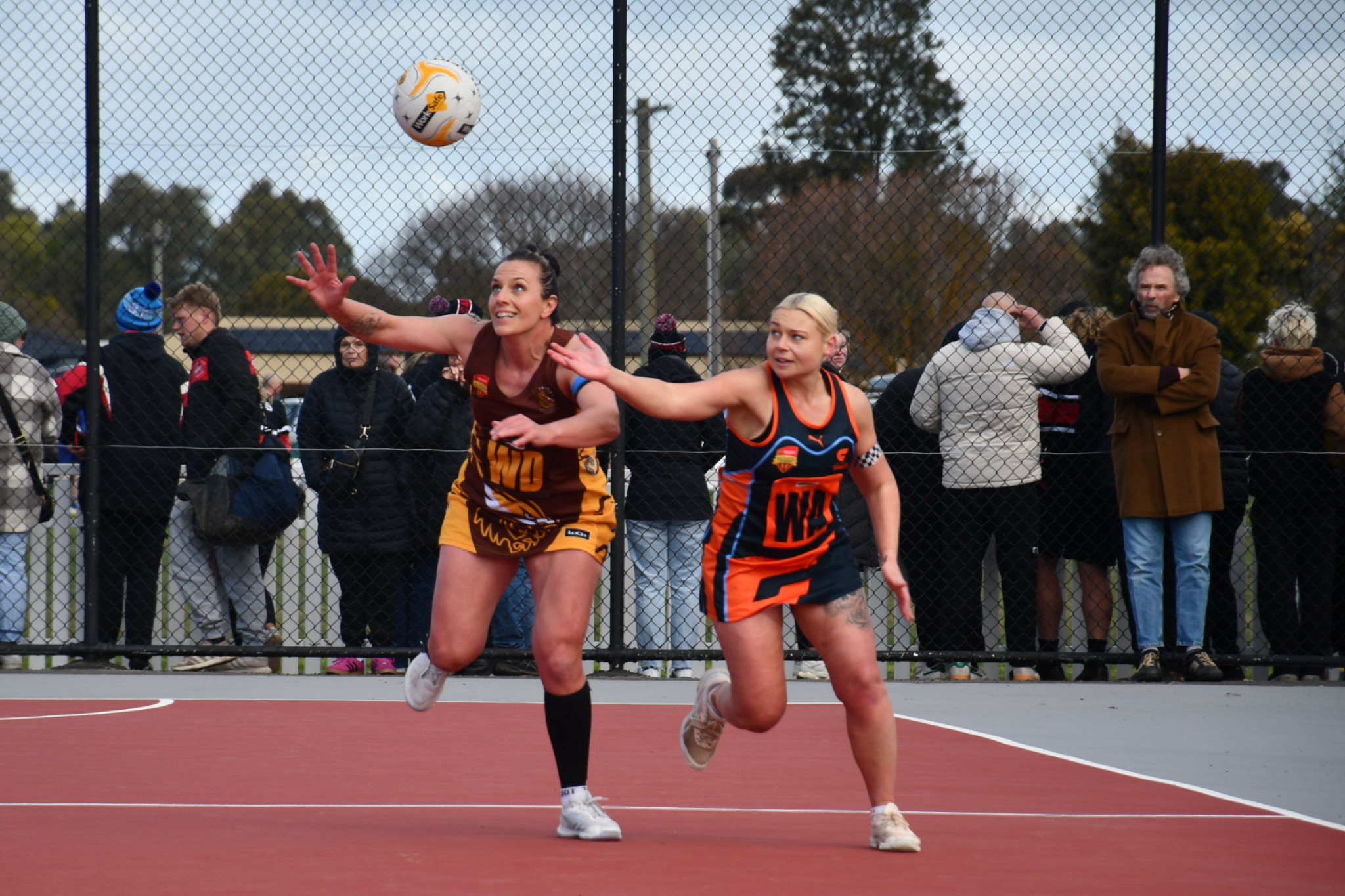 Talbot’s Melissa Scott and the Giants’ Christie Chapple contest a loose ball.