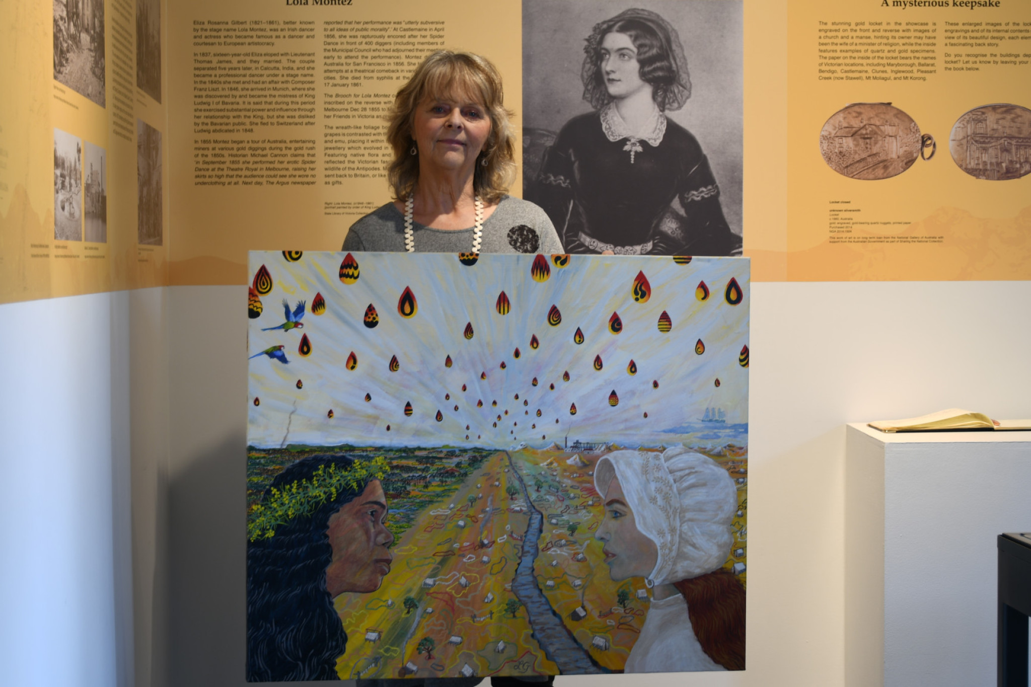 Linda Gallus with her painting ‘Telepathy’ featuring a First Nations woman with her three times great grandma. 071025 22