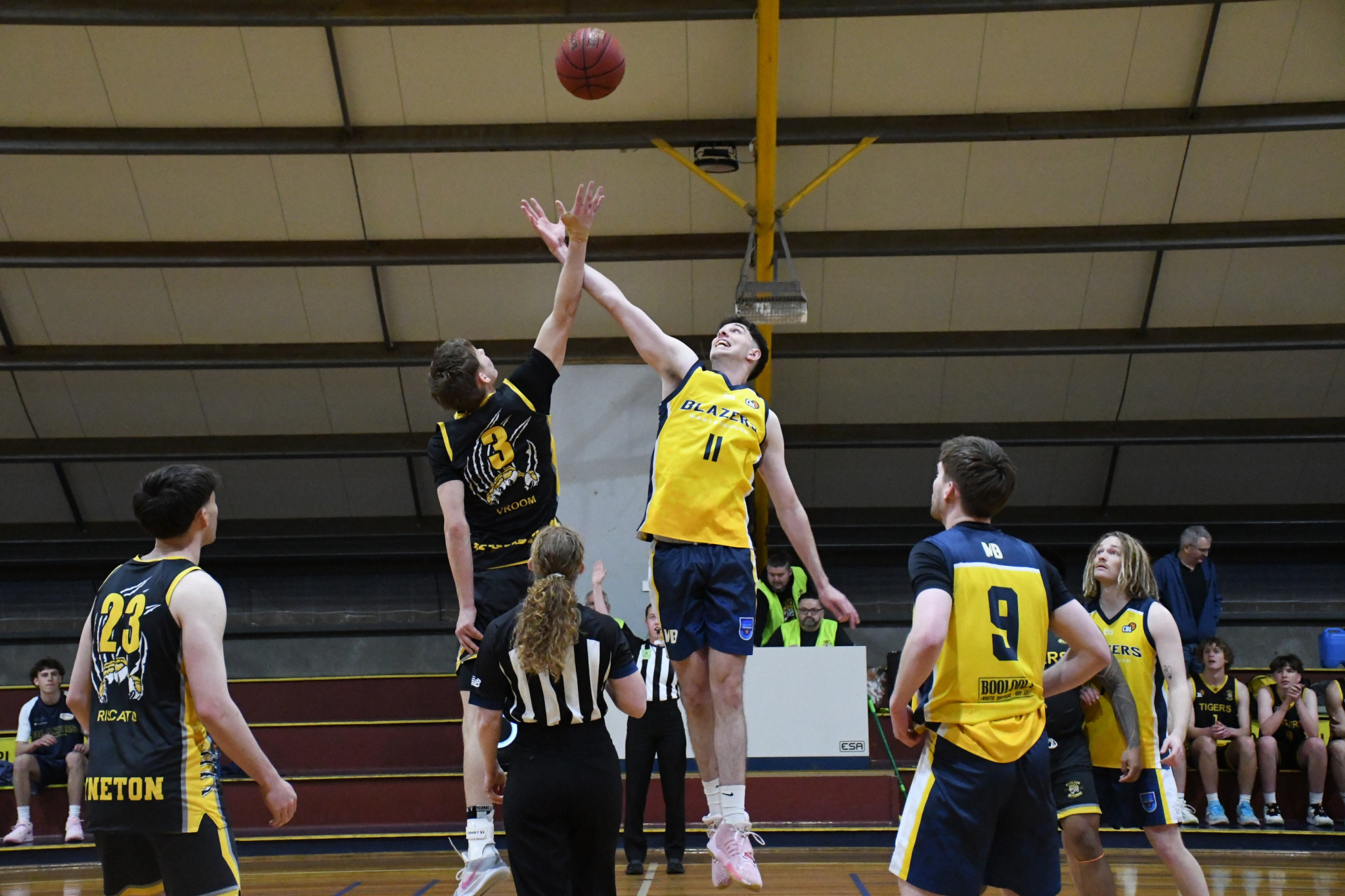 Kynan Carter goes for a jump ball for the Maryborough Blazers.