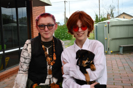 Donnie Brown, Isaac Duell and Penny the puppy got dressed up at Mill House on Friday night.