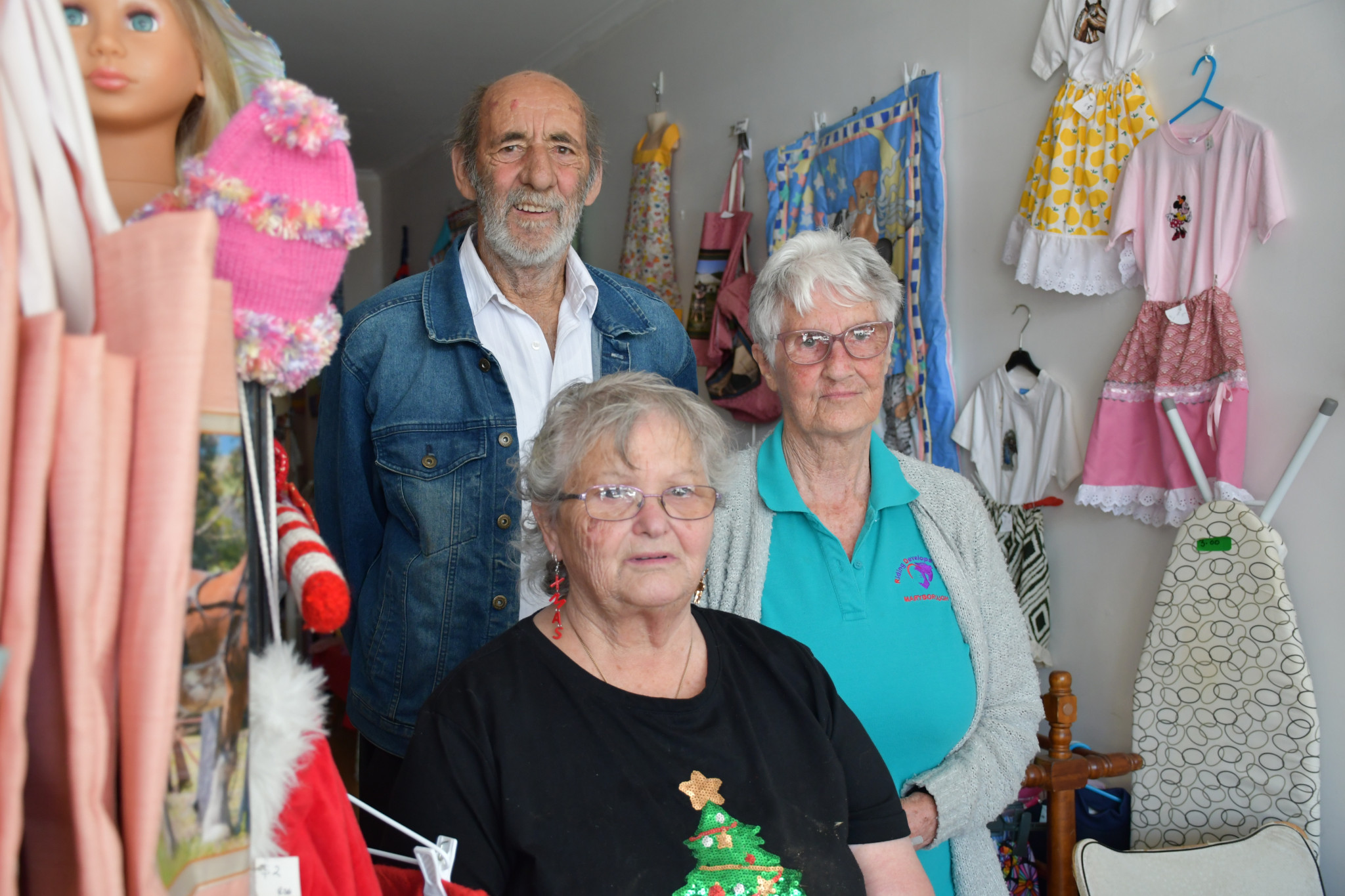 Volunteers Alan and Jenny Johnson as well as Adrienne Dickson have already seen many locals support this year&rsquo;s pop-up shop. 161225 19