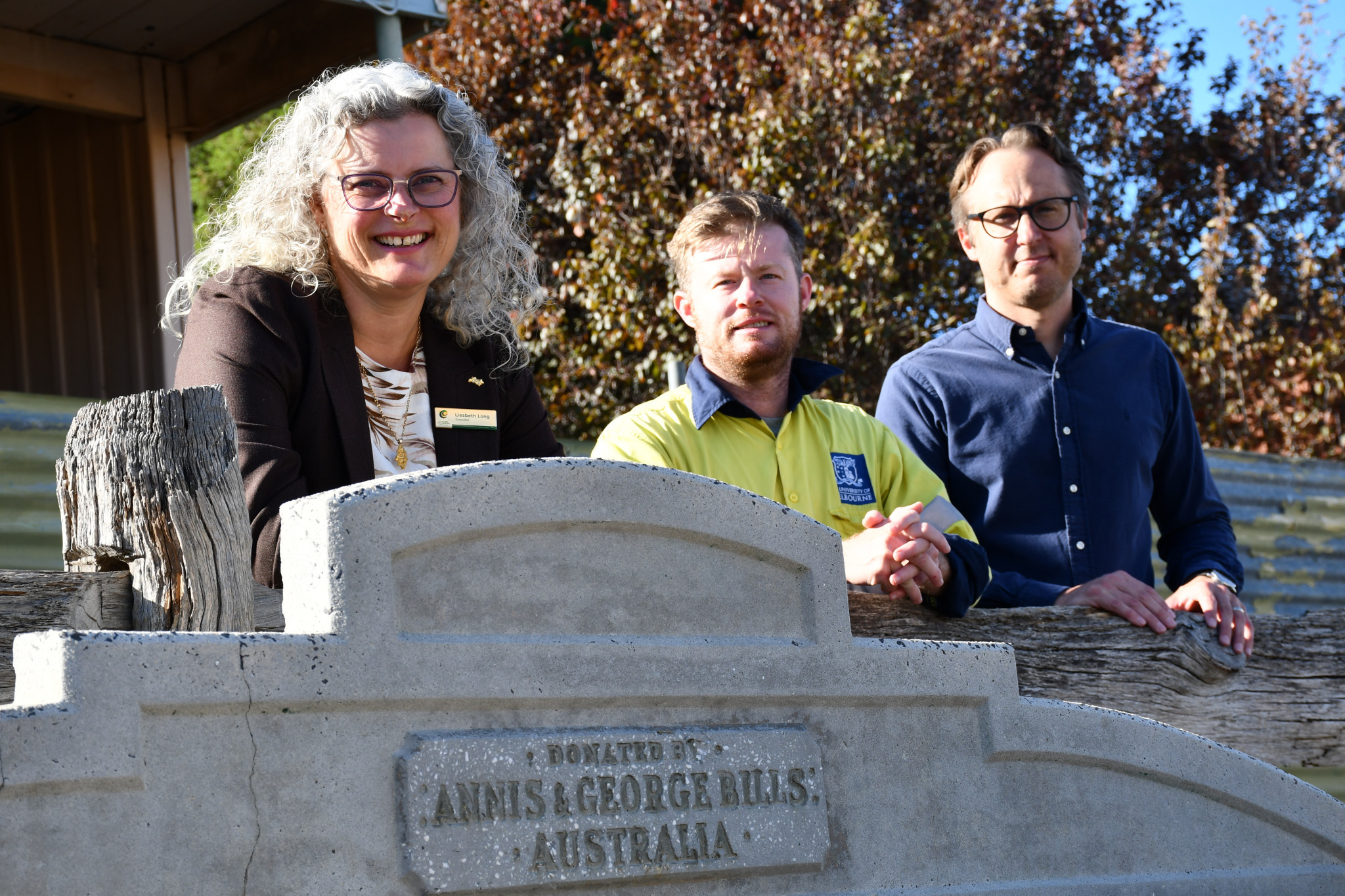 After years of effort, councillor Liesbeth Long (left) and project manager Kim Chamberlin (right) were thrilled to see history being conserved under Dr Evan Tindal’s stewardship (middle).