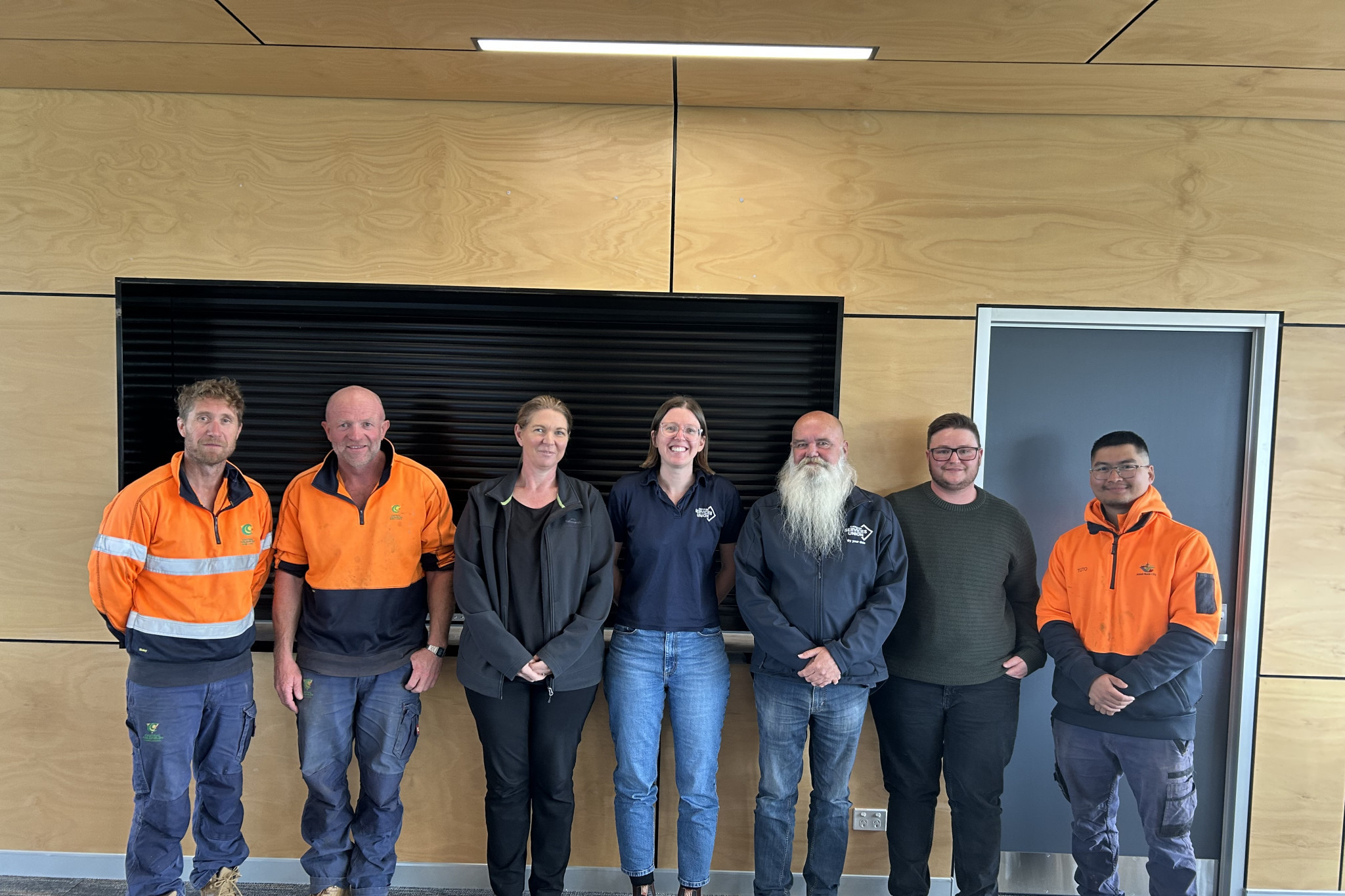 The ASU’s bargaining team from one of their meetings during the over year long process: Barry Smith, Phil Voutier, Mandy Tucker, Zoe Edwards, Billy King, Ben Sweeney, and Taw Taw Po San Ba. Photo: Supplied.