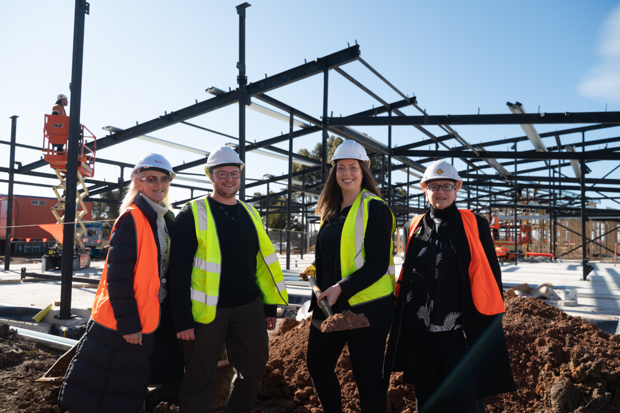 As construction has progressed throughout the year, Anne Gawith, Ben Sweeney, Martha Haylett and Sonia Jardine met last Thursday to officially turn the sod. Photo: Supplied.
