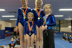 Kajari, Jaala, Isla and Cherry with their level four medals.